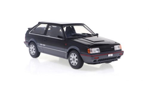 WHITEBOX - 1:24 Mazda 323 4WD Turbo, black/metallic dark grey, 1989 - WHITE BOX